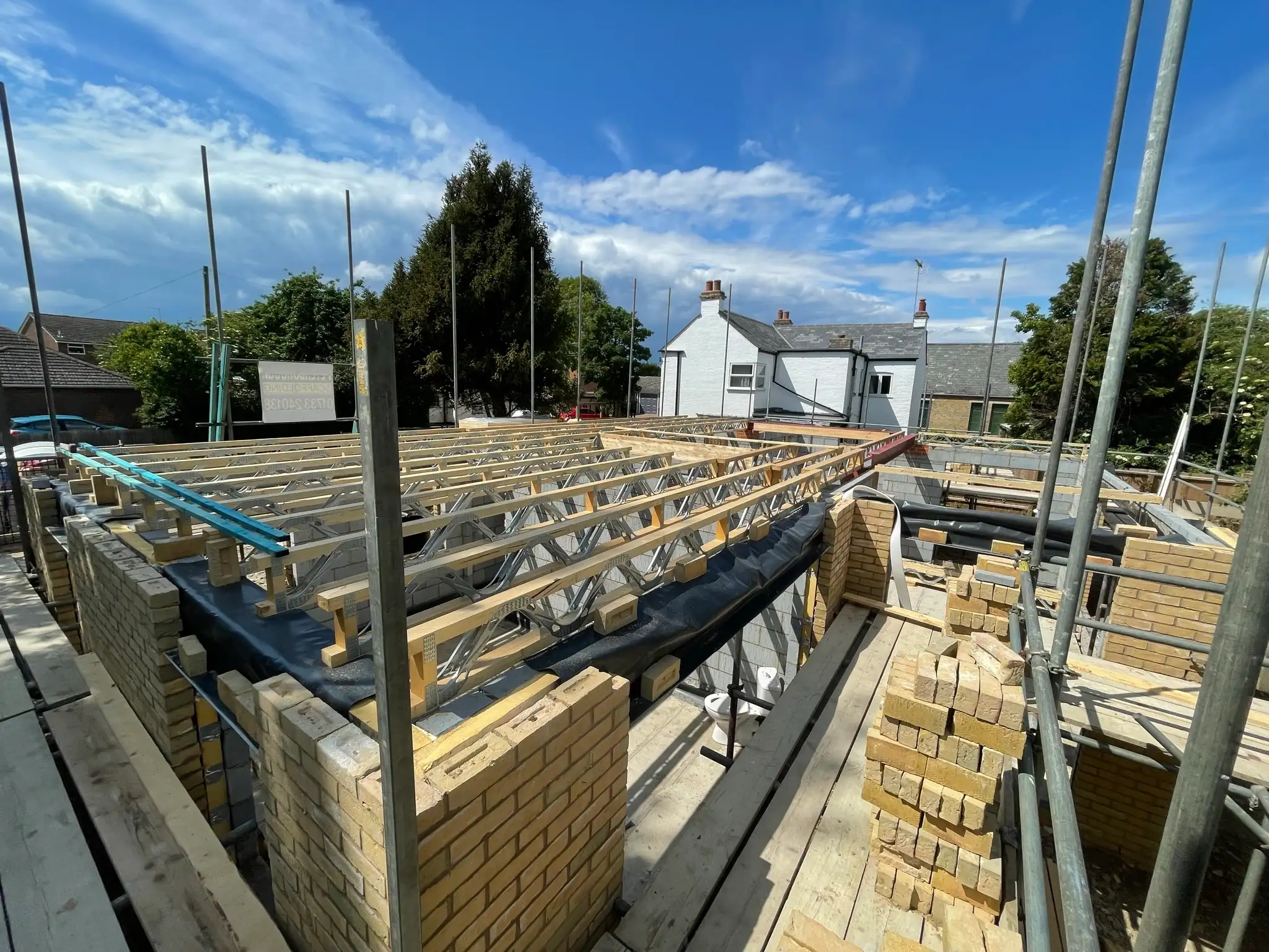 First floor joists and scaffolding on a new build